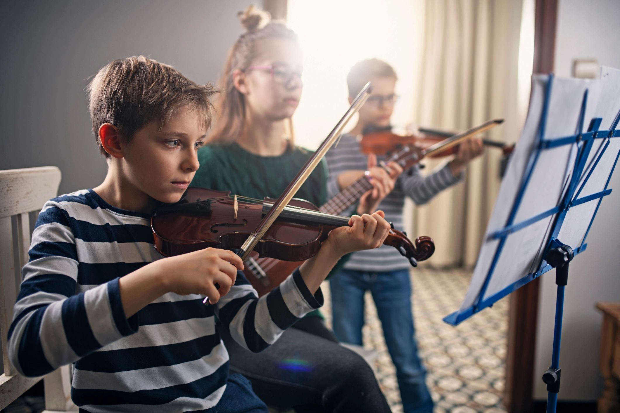 Students rehearsing music together
