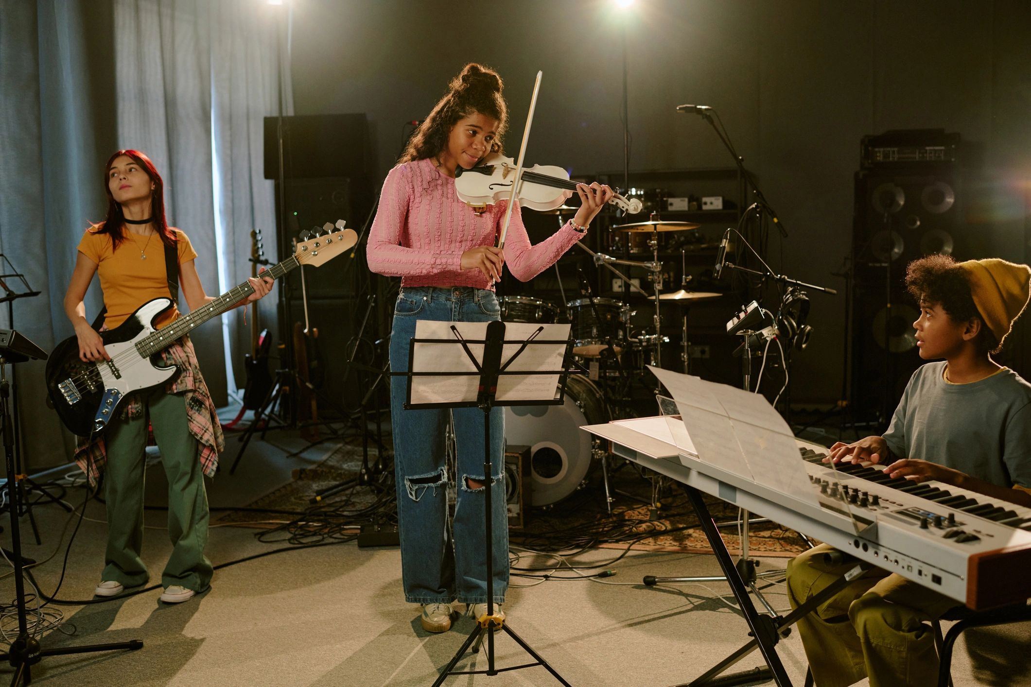 Students rehearsing together in a band setting